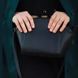 Grain-based leather bag