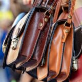 three assorted-color leather crossbody bags