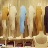 Mannequins display colorful leggings and athletic wear.